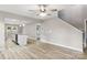 Open-concept living space with hardwood floors that seamlessly connects the living room to the kitchen island at 341 Bynum Ave, Rock Hill, SC 29732