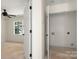 Image of an unfinished room with white walls, a window, and doors, awaiting your personal touch at 341 Bynum Ave, Rock Hill, SC 29732