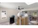 Open-concept room featuring stainless steel appliances, a ceiling fan, and a window, awaiting your personal touch at 341 Bynum Ave, Rock Hill, SC 29732
