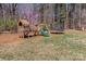 Backyard play area with playset, slide, and trampoline for outdoor fun and recreation at 345 Waccamaw Dr, Salisbury, NC 28146