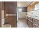 A full bathroom features a sink, wood paneling, and a shower/tub at 3467 Clearview Ln, Maiden, NC 28650