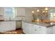 Spacious kitchen island with granite countertops and stainless steel appliances at 113 Asmodean Ln, Troutman, NC 28166