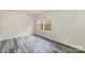 Bedroom with wood-look floors and bright, natural light at 3944 Wade E Morgan Rd, Charlotte, NC 28269