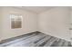 Well lit bedroom with modern vinyl plank flooring at 3944 Wade E Morgan Rd, Charlotte, NC 28269