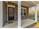 The house's front porch has stone accents and white pillars; the house number is displayed above the door at 3944 Wade E Morgan Rd, Charlotte, NC 28269