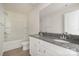 Bathroom with double sinks, granite countertops, a large mirror, and a shower-tub combo at 411 Wintergreen Ct # 2, Kings Mountain, NC 28086