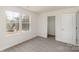 Comfortable bedroom with large windows, closet, and neutral decor at 411 Wintergreen Ct # 2, Kings Mountain, NC 28086