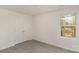 Cozy bedroom with a closet, large window, and hardwood floors at 411 Wintergreen Ct # 2, Kings Mountain, NC 28086