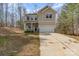 Two-story home featuring a two-car garage and porch at 411 Wintergreen Ct # 2, Kings Mountain, NC 28086