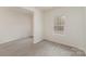 Bright room with light gray flooring and white walls at 411 Wintergreen Ct # 2, Kings Mountain, NC 28086