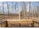Wooden deck with railings overlooking the surrounding trees at 418 Wintergreen Ct, Kings Mountain, NC 28086
