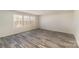 Bright bedroom with hardwood floors and three large windows for natural light at 418 Wintergreen Ct, Kings Mountain, NC 28086