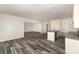 Spacious open floor plan with durable flooring, a center island with sink, and an open living concept at 418 Wintergreen Ct, Kings Mountain, NC 28086