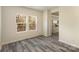 Open living space featuring durable floors, natural light, and seamless access to the well-lit kitchen at 418 Wintergreen Ct, Kings Mountain, NC 28086