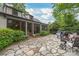 Spacious stone patio with seating area, perfect for outdoor entertaining and relaxation at 600 S Central Ave, Belmont, NC 28012