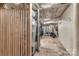 A basement with exposed pipes and a storage area, perfect for organizing and maximizing space at 600 S Central Ave, Belmont, NC 28012