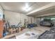 A well lit and organized garage space with car parked inside, offering secure parking and storage at 600 S Central Ave, Belmont, NC 28012