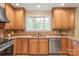 Modern kitchen with granite countertops, stainless steel appliances, and ample cabinet space at 600 S Central Ave, Belmont, NC 28012