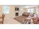 Cozy living room with a fireplace, leather sofa, and an inviting atmosphere at 600 S Central Ave, Belmont, NC 28012