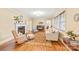 Inviting living room with a fireplace, hardwood floors, and a comfortable seating area at 600 S Central Ave, Belmont, NC 28012