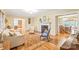 Cozy living room with fireplace, hardwood floors, and ample natural light at 600 S Central Ave, Belmont, NC 28012