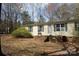 Exterior of home with a brick porch and two chairs at 7597 Webbs Rd, Denver, NC 28037
