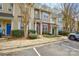 Well-maintained townhome exterior with neat landscaping, brick accents, and easy parking access at 8364 Chaceview Ct, Charlotte, NC 28269