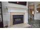 Elegant fireplace with marble surround, providing a focal point in the living space at 8364 Chaceview Ct, Charlotte, NC 28269