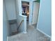 Carpeted hallway with view into bedroom at 8364 Chaceview Ct, Charlotte, NC 28269