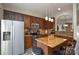 Modern kitchen with stainless steel appliances, granite countertops, and ample cabinet space at 8364 Chaceview Ct, Charlotte, NC 28269