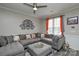 Cozy living room with a plush sectional sofa, soft lighting, and stylish accents at 8364 Chaceview Ct, Charlotte, NC 28269