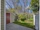 Backyard featuring a patio, grass area, a small shed, and wooden pergola at 961 Sardis Cove Dr, Charlotte, NC 28270