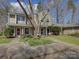 Charming townhome with a well-maintained lawn and mature tree, creating a welcoming curb appeal at 961 Sardis Cove Dr, Charlotte, NC 28270