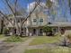 Inviting exterior view of a well-maintained townhome with a manicured lawn and sidewalk at 961 Sardis Cove Dr, Charlotte, NC 28270