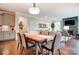 The dining area is filled with light and neutral tones that complements the kitchen and living area at 1018 Heritage Pointe # 302, Indian Trail, NC 28079
