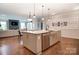 Spacious open concept kitchen featuring an island, stainless steel appliances and plenty of storage at 1018 Heritage Pointe # 302, Indian Trail, NC 28079