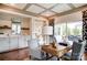 Well-appointed office area with built-in cabinets, wine storage, and an open view of the outdoor patio at 1018 Heritage Pointe # 302, Indian Trail, NC 28079