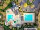 Aerial view of community pool featuring a slide, swimming lanes, and relaxing lounge area at 1110 Woodhall Dr, Huntersville, NC 28078