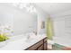 Clean and modern bathroom with updated fixtures, vanity, and tub at 11320 Joe Morrison Ln, Charlotte, NC 28214