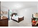 Comfortable bedroom featuring neutral walls and soft natural light at 11320 Joe Morrison Ln, Charlotte, NC 28214