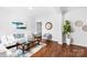 Inviting living room showcases hardwood floors and stylish furnishings at 11320 Joe Morrison Ln, Charlotte, NC 28214