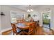 Dining room with hardwood flooring and a dining table at 116 S Westover Dr, Monroe, NC 28112
