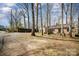 Charming single-story home with a well-maintained yard and mature trees at 116 S Westover Dr, Monroe, NC 28112