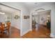 Inviting interior showcasing hardwood floors, neutral paint, and seamless transitions to living spaces at 116 S Westover Dr, Monroe, NC 28112