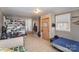 Functional room featuring a cozy sitting area, workspace, and convenient built-in shelving at 116 S Westover Dr, Monroe, NC 28112