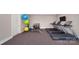 Community gym with three treadmills, free weights, exercise balls, and rubber flooring at 121 Asmodean Ln, Troutman, NC 28166
