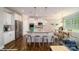 Beautiful kitchen with a large island, stainless steel appliances, and a dining area at 121 Asmodean Ln, Troutman, NC 28166