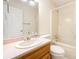 Cozy bathroom featuring a shower and tub combination, toilet, and vanity with a sink and large mirror at 126 Harbourtown Dr, Kings Mountain, NC 28086