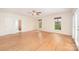 Spacious bedroom with hardwood floors, a ceiling fan, and natural light from the windows at 126 Harbourtown Dr, Kings Mountain, NC 28086