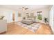 Comfortable bedroom featuring hardwood floors, neutral tones, and ample natural light at 126 Harbourtown Dr, Kings Mountain, NC 28086